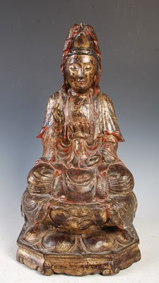 Lot 546 - A Chinese carved wood figure of Guanyin, late...