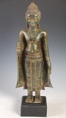 Lot 589 - A bronze figure of the female deity Khmer,...