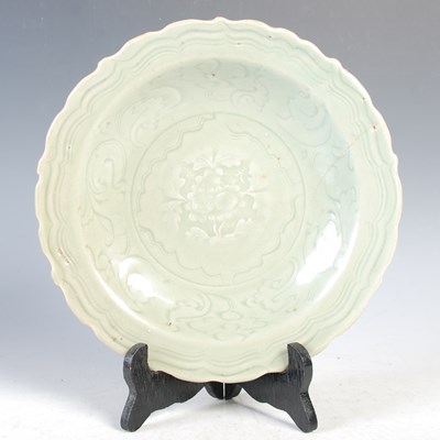 Lot 512 - A Chinese porcelain celadon dish, Qing Dynasty,...