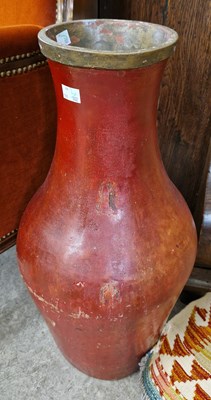 Lot 817 - A large red ground terracotta flagon with...