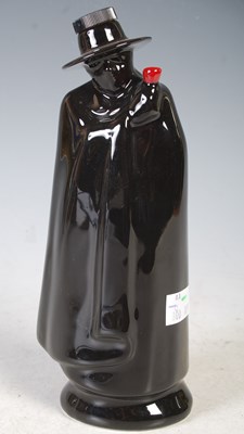 Lot 9 - A Wade pottery decanter in the form of a black...