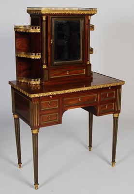 Lot 93 - A late 19th century French mahogany and brass...