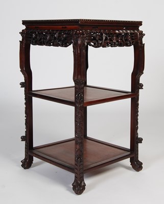 Lot 69 - A Chinese darkwood urn stand, Qing Dynasty,...