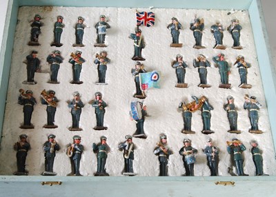 Lot 355 - A wooden box containing a lead military brass...