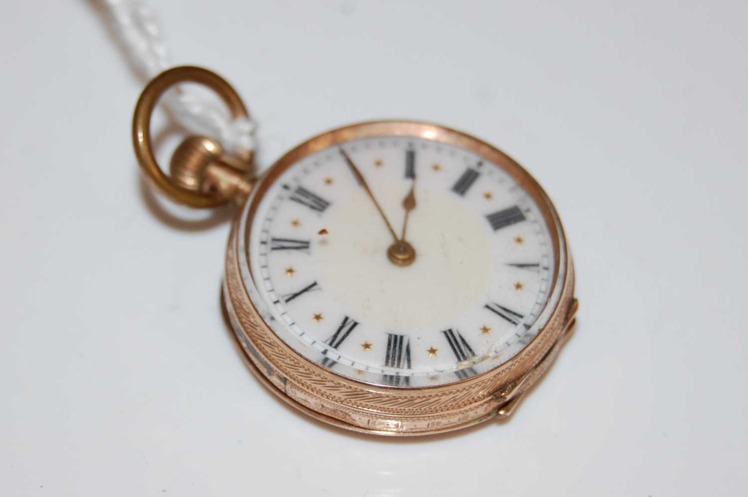 Lot 175 - A yellow metal fob watch stamped '9C' with...