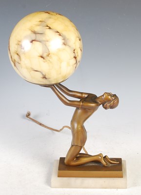 Lot 409 - An Art Deco style figural table lamp, modelled...