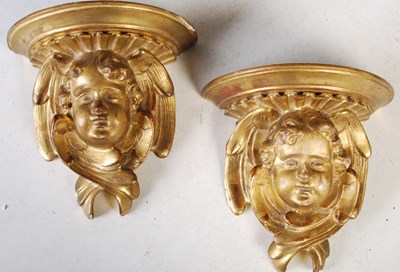 Lot 414 - A pair of Antique gilt wood wall brackets, in...