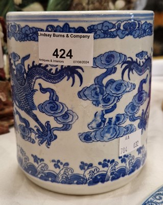 Lot 424 - A Chinese blue and white brush pot, decorated...