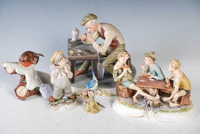 Lot 429 - Four Capodimonte figure groups, to include a...