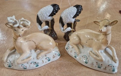 Lot 3 - A pair of Staffordshire figure groups of a...