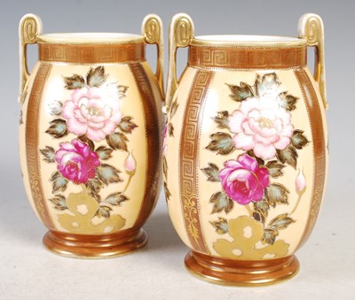 Lot 5 - A pair of Noritake porcelain twin-handled...