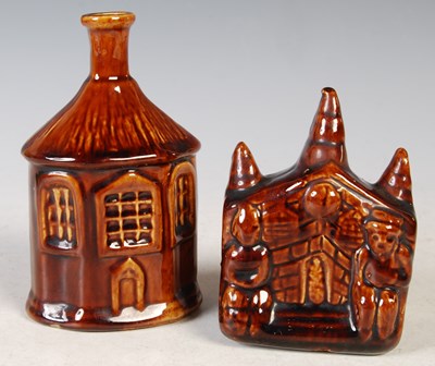 Lot 7 - A 19th century brown glazed pottery money bank...