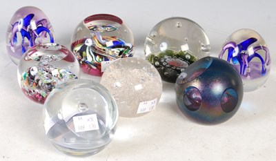 Lot 21 - Eight assorted paperweights.