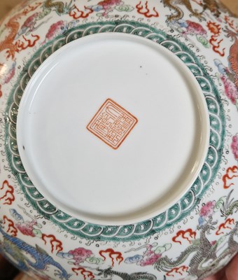Lot 487 - A boxed Chinese eggshell porcelain dragon bowl,...