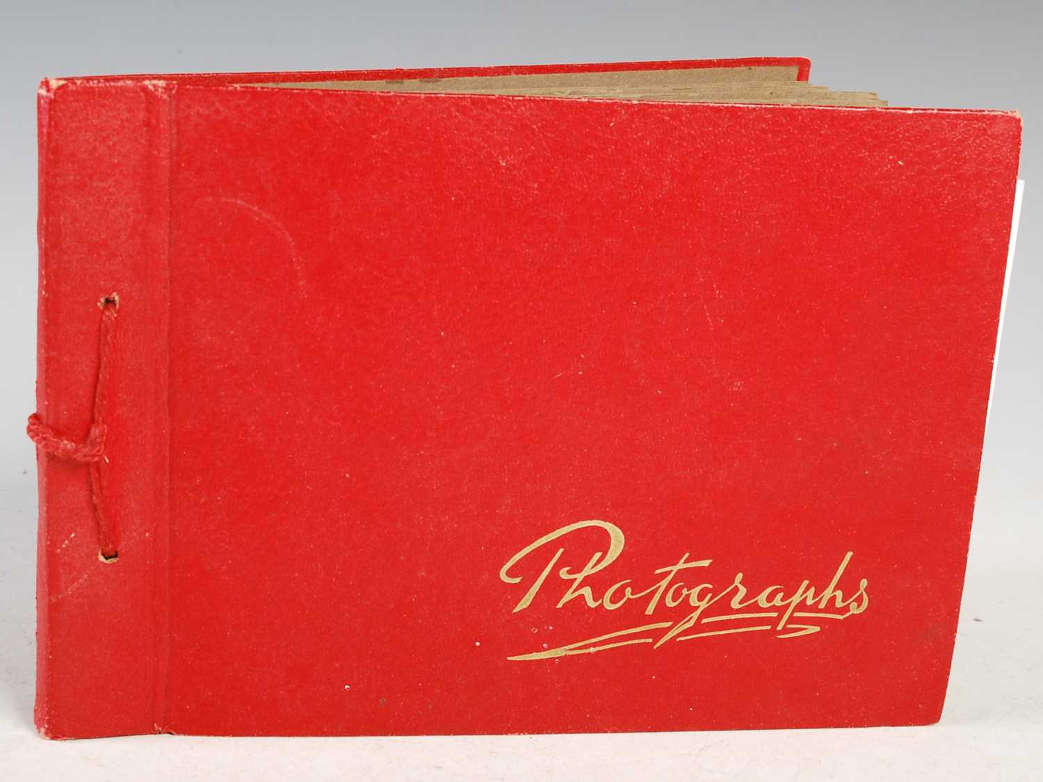 Lot 54 - A red-coloured vintage photograph album