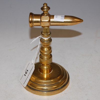 Lot 191 - A miniature brass tabletop goffering iron stand.