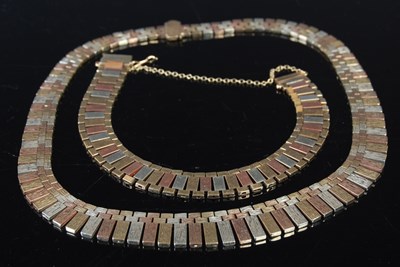 Lot 67 - A 9ct three-coloured gold necklace, together...