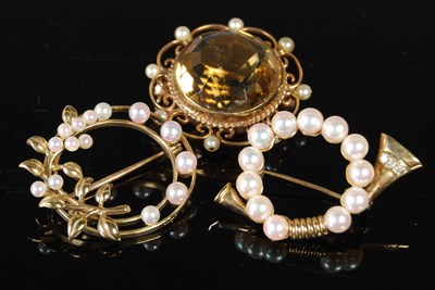 Lot 71 - A 9ct gold citrine and pearl set brooch,...