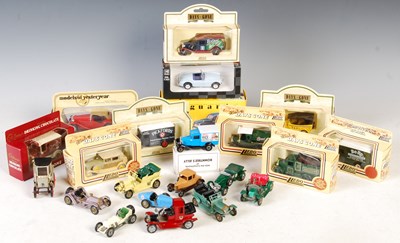 Lot 521 - A collection of boxed and unboxed vintage toy...