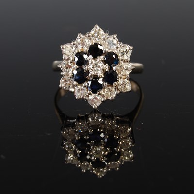 Lot 84A - A white metal diamond and sapphire cluster...