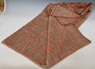 Lot 543 - A vintage Paisley shawl, worked in red, green...