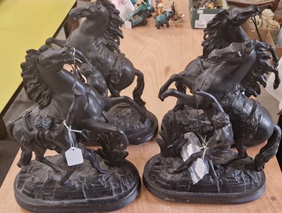 Lot 548 - Two pairs of cast metal Marley horses, after...