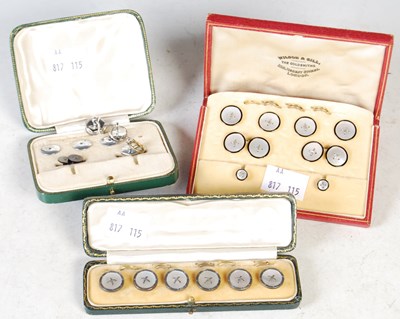 Lot 120 - A cased set of six mother of pearl shirt studs,...