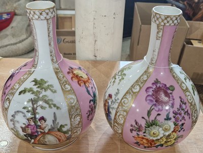 Lot 557 - A pair of Dresden porcelain bottle vases,...