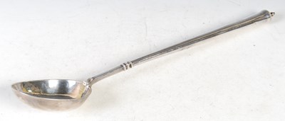 Lot 127 - A large continental white metal serving spoon...