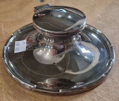 Lot 139 - A Birmingham silver capstan inkwell with clear...