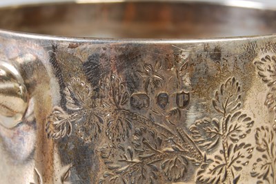Lot 149 - Two silver christening mugs, one with London...