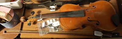 Lot 269 - A light coloured violin and bow, the underside...