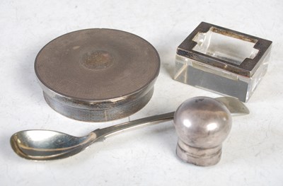 Lot 161 - A group of silver items to include egg spoon,...