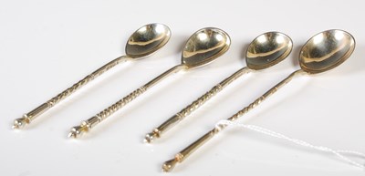 Lot 173 - Three Russian silver teaspoons, each with...