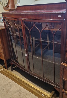 Lot 708 - A 19th century mahogany bowfront bookcase,...