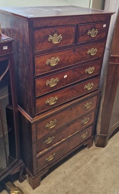 Lot 709 - A reproduction mahogany chest on chest, with...