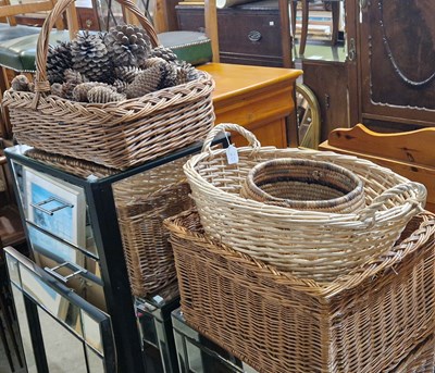 Lot 737 - A group of four wicker baskets, containing...