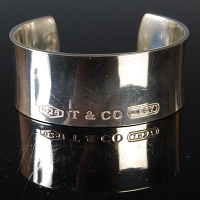 Lot 201 - A Tiffany & Co Sterling silver cuff bangle,...