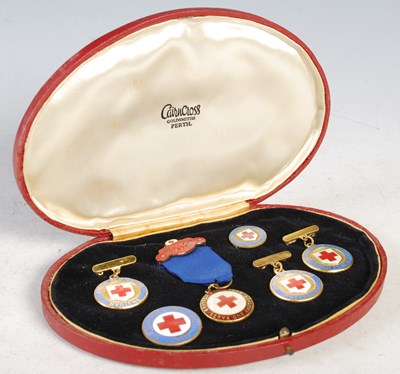 Lot 279 - A cased set of six Red Cross medallions...