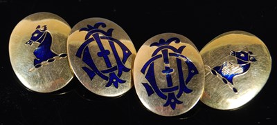 Lot 281 - A pair of yellow metal and blue enamel oval...