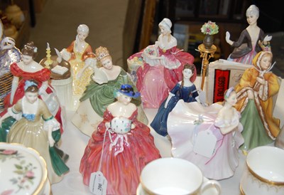 Lot 296 - A group of ten Royal Doulton lady figures,...