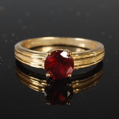 Lot 316 - A 9ct gold and synthetic ruby single stone...