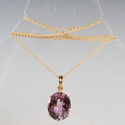 Lot 322 - A 9ct gold necklace suspending 9ct gold...