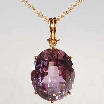 Lot 322 - A 9ct gold necklace suspending 9ct gold...