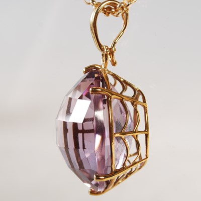 Lot 322 - A 9ct gold necklace suspending 9ct gold...