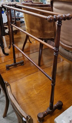 Lot 794 - A group of three assorted towel rails...