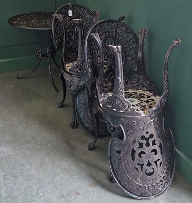 Lot 802 - A black painted cast metal garden bistro set...