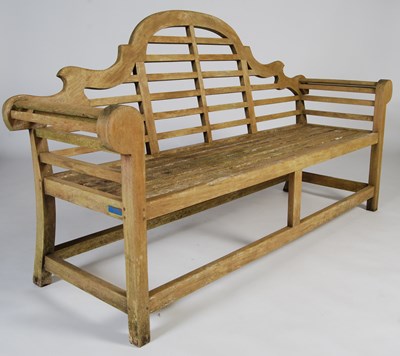 Lot 120 - A 20th century teak garden bench, after a...