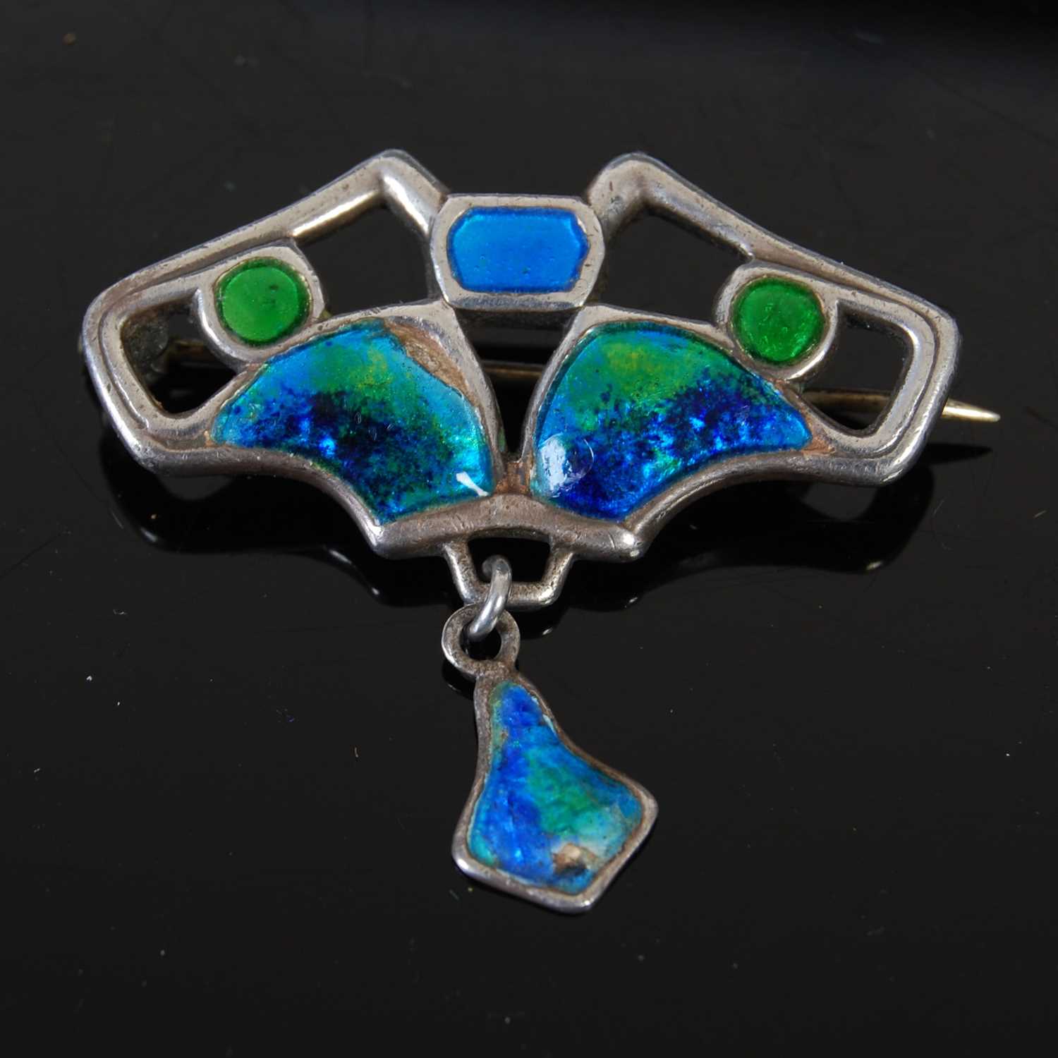 Lot 122 - Charles Horner, a silver and enamel brooch...
