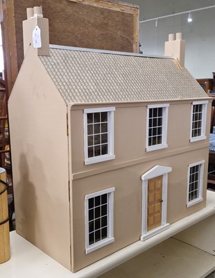 Lot 821 - A 20th century doll's house the hinged front...